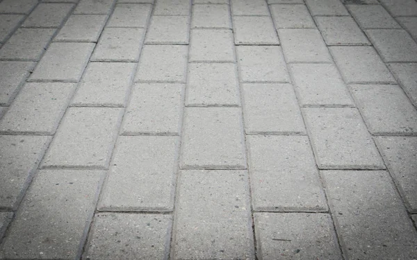 Background from large number of gray paving stones — Stock Photo, Image