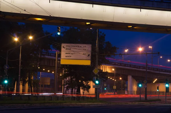 green traffic lights in evening highway