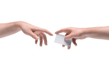 Two male hands passing one another blank business card on white background clipart