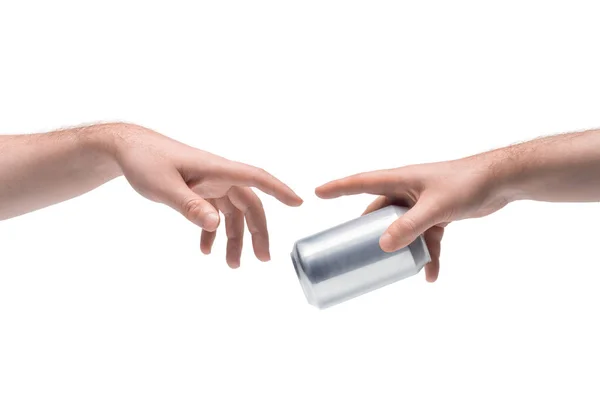 Dos manos masculinas pasando una a la otra lata de soda metálica en blanco sobre fondo blanco —  Fotos de Stock