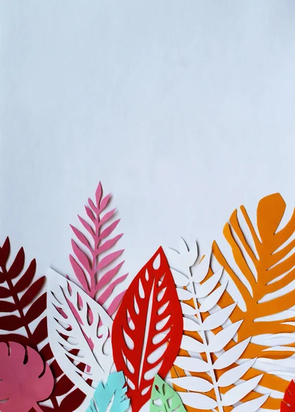 colorful paper leaves on the white background