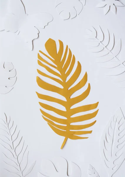 paper yellow leaf on the white background