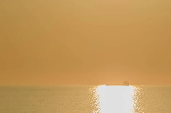 Shining sea with ship — Stock Photo, Image