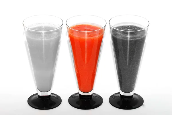 Two gray and one red smoothies with white — Stock Photo, Image