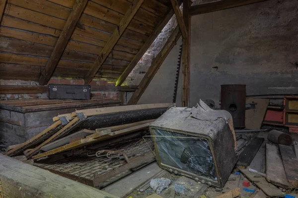 Old television on an attic — Stock Photo, Image