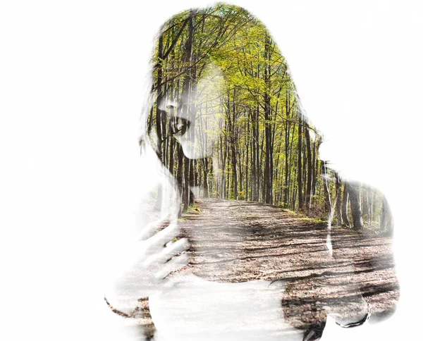 Portrait of a young woman with the effect of double exposure — Stock Photo, Image