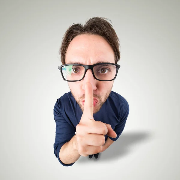 Man say Shh with hand gesture — Stock Photo, Image