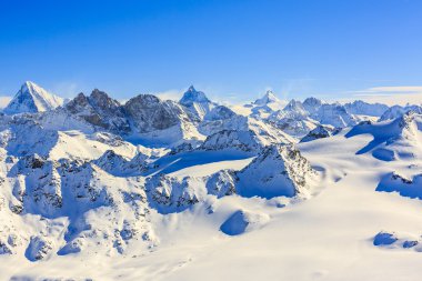  Amazing view of swiss famous moutains in beautiful winter snow. clipart