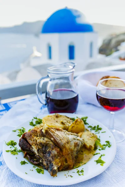 Greek food and homemade red wine — Stock Photo, Image