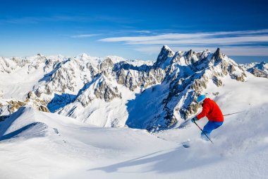 Skiing Vallee Blanche Chamonix with amazing panorama of Grandes  clipart
