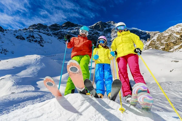Happy family enjoying winter vacations in mountains. Playing wit — Stock Photo, Image