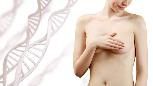 Ung kvinna täcka bröst för neoplasmer bland Dna kedjor. — Stockfoto