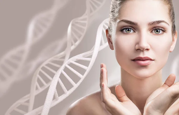 Portrait of sensual woman among white DNA chains. — Stock Photo, Image