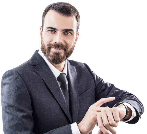 Joven hombre de negocios guapo usando reloj inteligente . — Foto de Stock