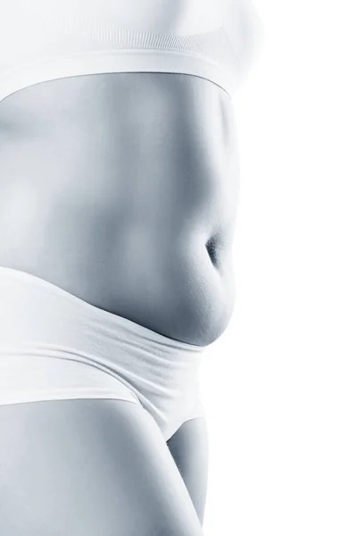 Vue latérale de la femme avec le gros ventre. Concept d'obésité . — Photo