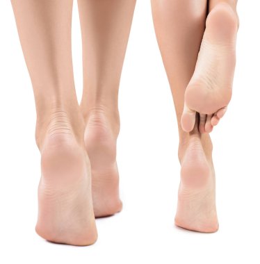 Pürüzsüz ciltli mükemmel kadın ayakları.