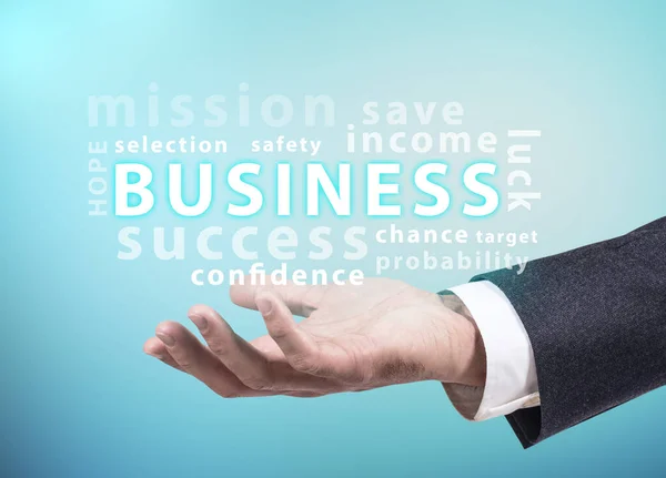 Бизнесмен представляет группу бизнес-слов . — стоковое фото