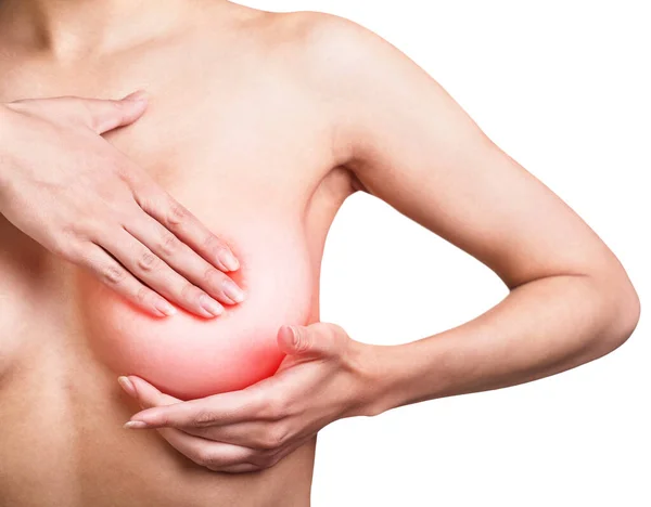 Жінка вивчає груди для ознак раку молочної залози . — стокове фото
