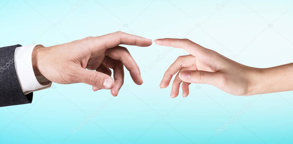 Two hands touching each other.