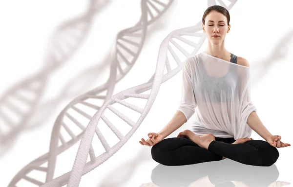 Junge Frau praktiziert Yoga in der Nähe großer Molekülketten. — Stockfoto