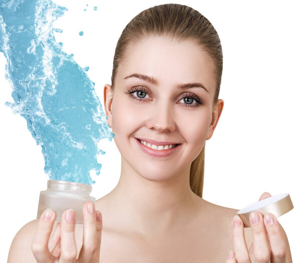 Beautiful woman holding and presenting cream product.