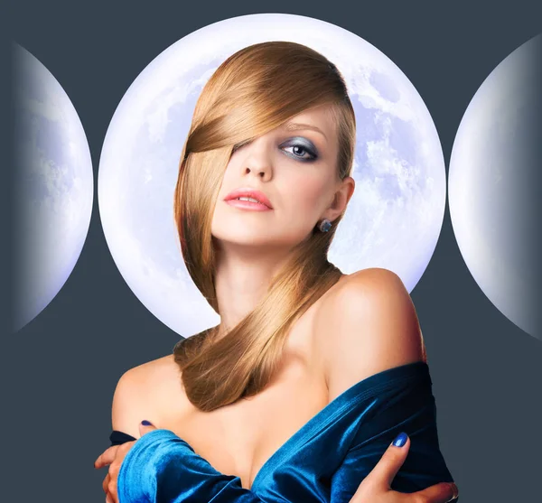 Stylish young woman over full moon background. — Stock Photo, Image