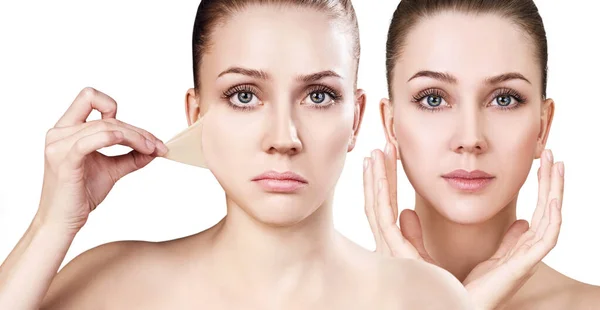 Woman removes her old dry skin from face. — Stock Photo, Image