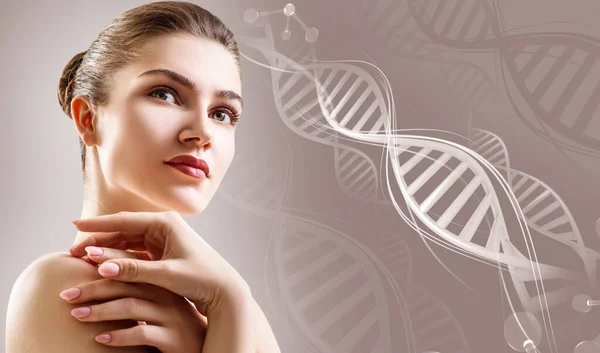 Portrait of sensual woman among white DNA chains. — Stock Photo, Image