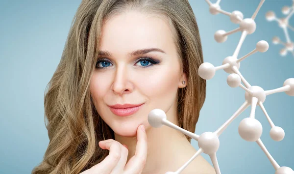 Beautiful woman with big white molecule chain. v — Stock Photo, Image