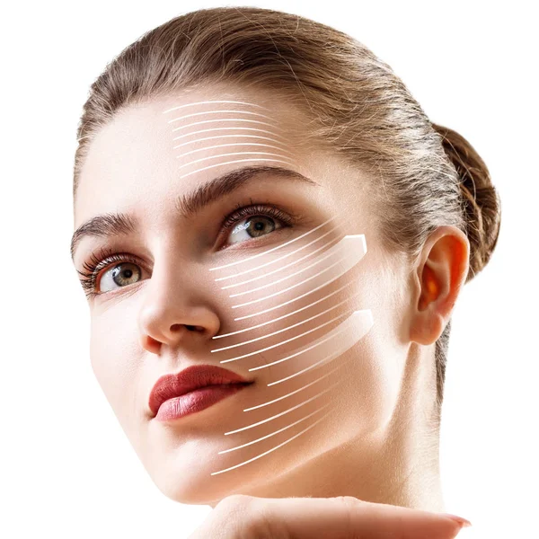 Linhas gráficas mostram o efeito lifting facial na pele . — Fotografia de Stock