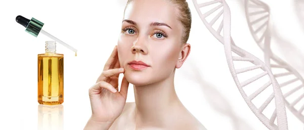 Cosmetic primer oil applying on woman face over dna background. — ストック写真