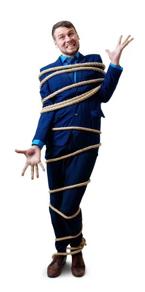 Arrabbiato uomo d'affari legato con corda cercando di fuggire . — Foto Stock