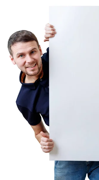 Affärsman kika ut från tomt vitt ark för textutrymme — Stockfoto