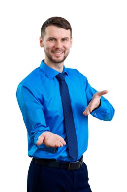 Young business man presenting open hand. Advertisement concept.