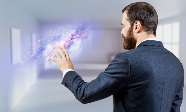 Businessman touching space portal with hand. — Stock Photo, Image