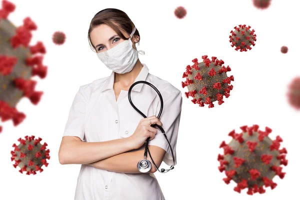 Jonge vrouwelijke arts onder virale cellen coronavirus. — Stockfoto