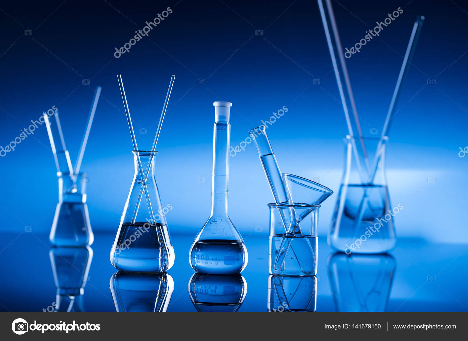 Modern laboratory glassware Stock Photo by ©zolnierek 141679150