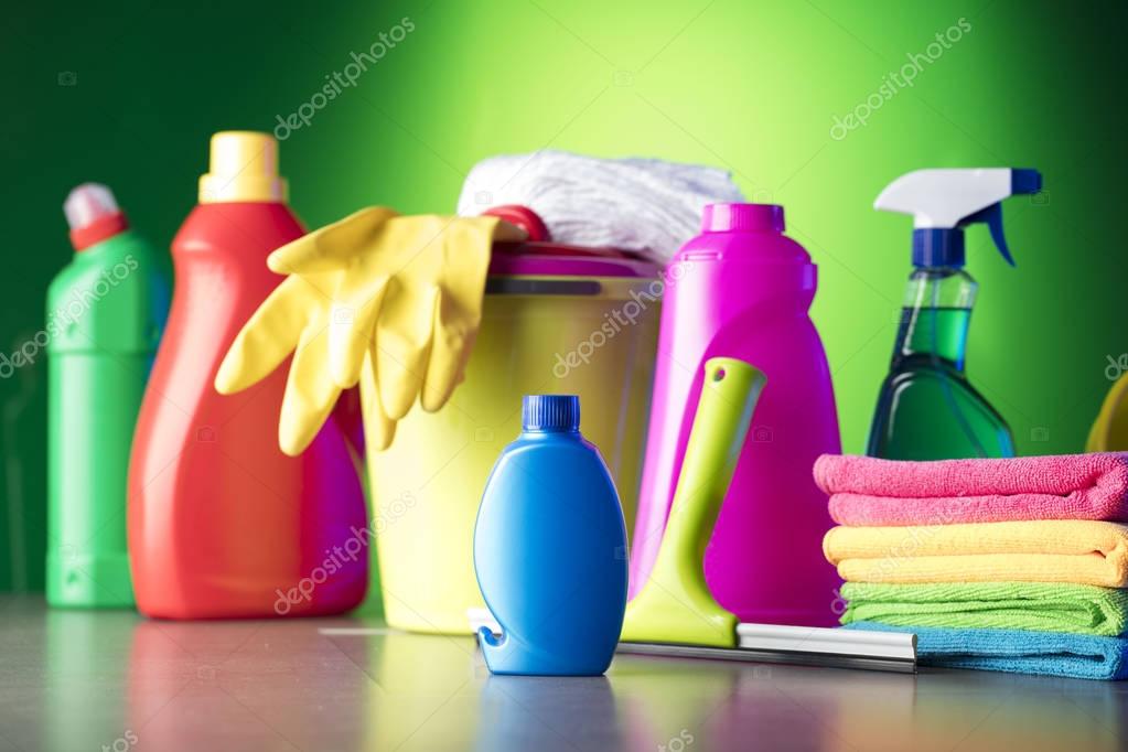 Variety of  house cleaning products on a colorful background. Place for logo and typography.
