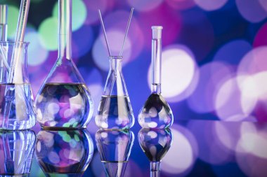 Bokeh arka plan, laboratuvar kadehler ile deneme kavramı.