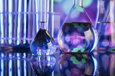 Bokeh arka plan, laboratuvar kadehler ile deneme kavramı.