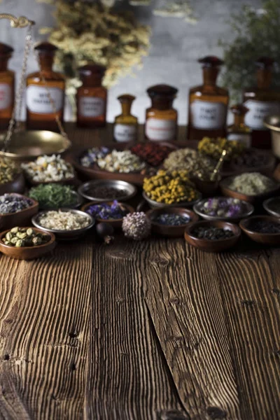 Alternative Medicine Herbs Bowls Mortar Medicine Bottles Wooden Rustic Table — Stock Photo, Image