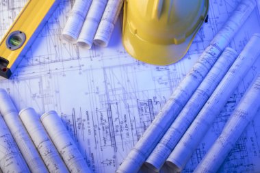 Yüklenici kavramı arka plan. Planları, libela ve kask oluşturucu rulo. Metin için yer.