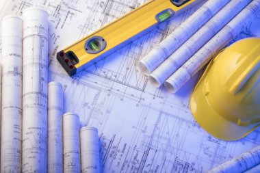 Yüklenici kavramı arka plan. Planları, libela ve kask oluşturucu rulo. Metin için yer.