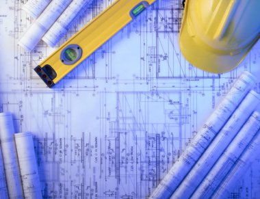 Yüklenici kavramı arka plan. Planları, libela ve kask oluşturucu rulo. Metin için yer.