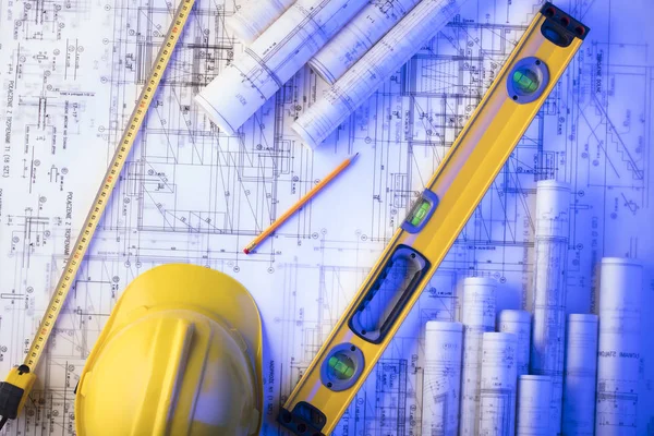 Yüklenici kavramı arka plan. Planları, libela ve kask oluşturucu rulo. Metin için yer.