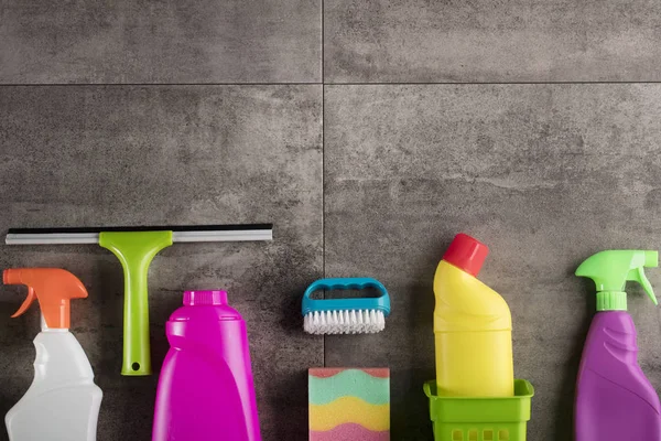 Spring Cleaning Concept Colorful Cleaning Products Gray Tiles Place Typography — Stock Photo, Image