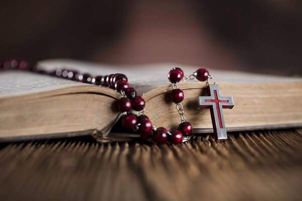 Holy communion concept. Holy Bible and rosary. 