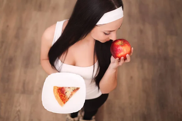 Choose between junk food versus healthy diet — Stock Photo, Image