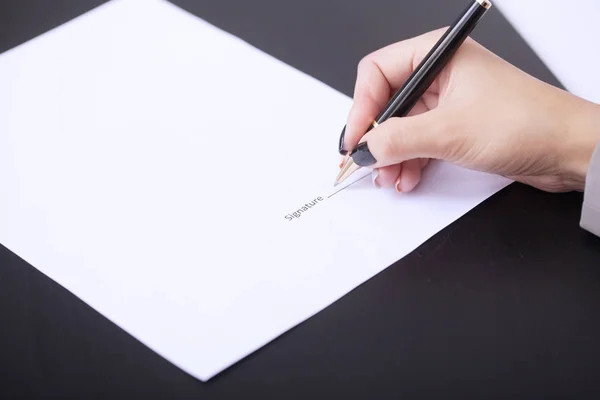 Customer signing contract, agreed terms and approved application Stock Photo