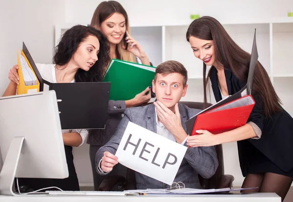 Frustrated attractive businessman in her 20s holding help sign d — Stock Photo, Image